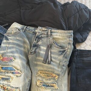 AMIRI Light Blue Distressed Skinny Jeans